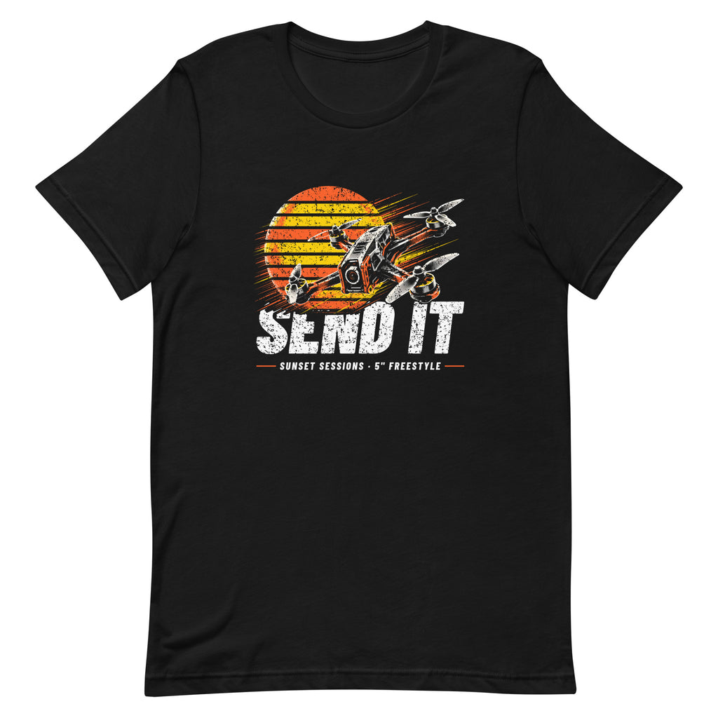 Sunset Tee in Black, front: halftone FPV quad over a striped sunset with SEND IT